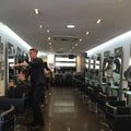 Full shot of a salon with LED tape in the frosted glass