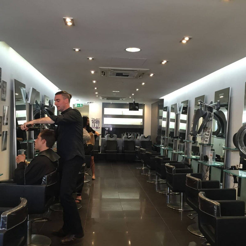 Full shot of a salon with LED tape in the frosted glass