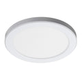Product shot of Discus LED downlight with white bezel on white background.