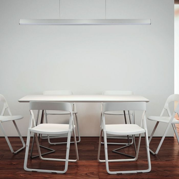 white linear LED light over a table and chairs