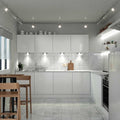 Full shot of a kitchen with a triangle LED under cabinet light with natural white light