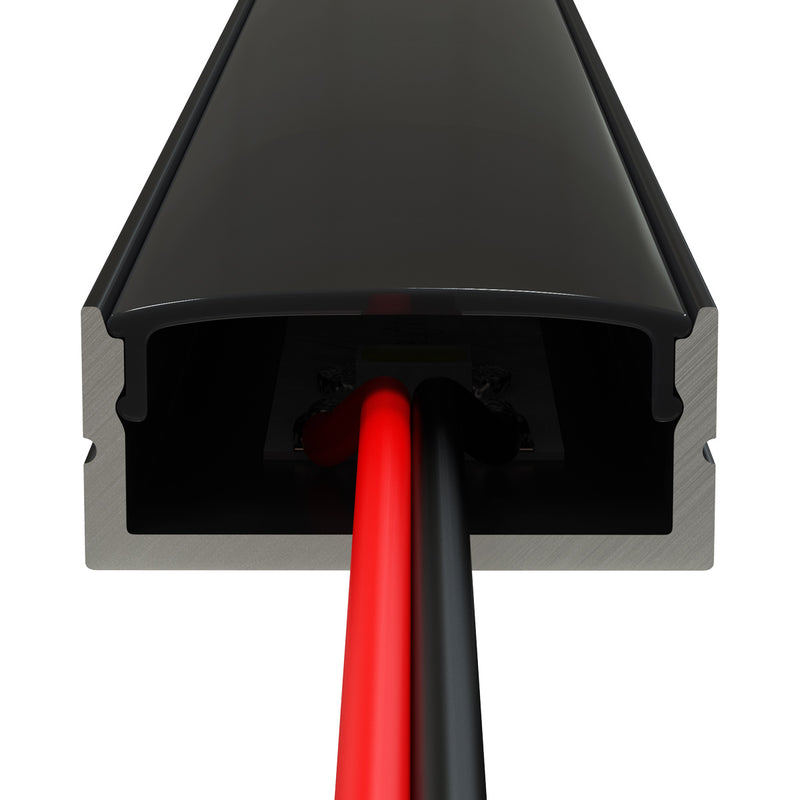front of a black surface-mounted LED profile with an LED strip