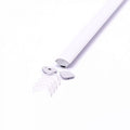 A corner-mount aluminium LED profile with a white diffuser cover on a white surface, with mounting clips and end caps lying on one of its ends.