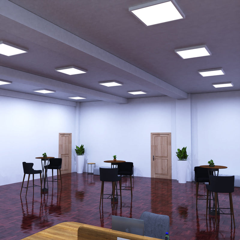 sideshot of an office with cool white surface mounted panel lights