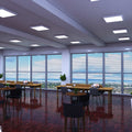 mid shot of an office with cool white surface mounted panel lights