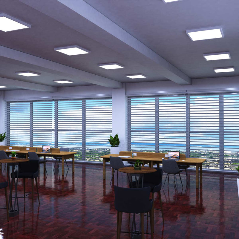 mid shot of an office with cool white surface mounted panel lights