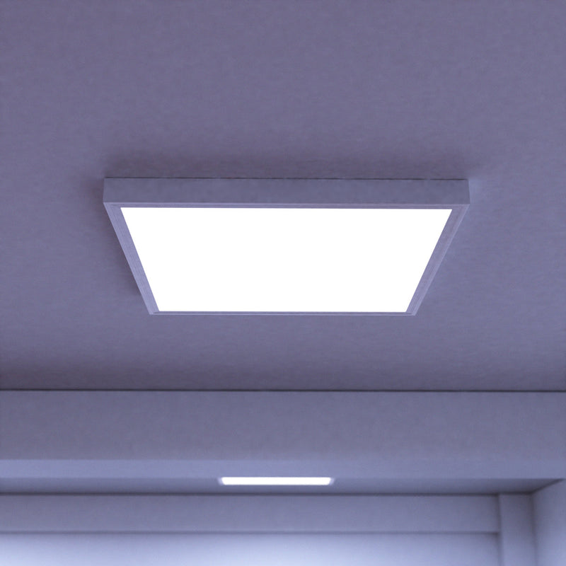close up of an installed surface mounted panel light with cool white light