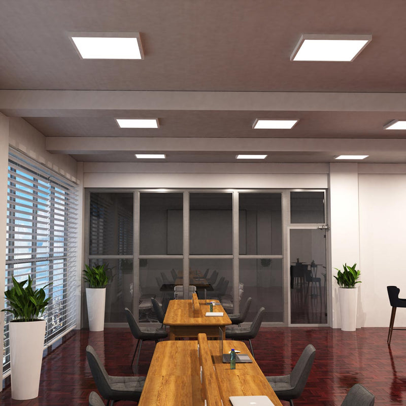 full shot of an office with mounted natural white LED panels