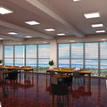 side long shot of an office with mounted natural white LED panels