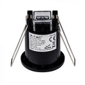 side of a recessed black PIR sensor