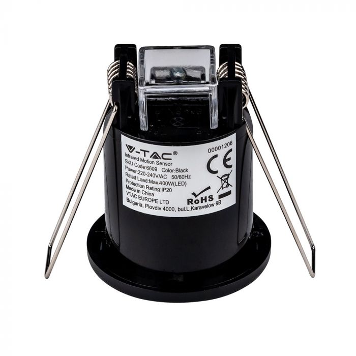 side of a recessed black PIR sensor