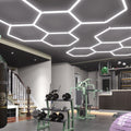 1 x Hexagon LED Light Kit - Cool White, White Finish (in action) - Gym