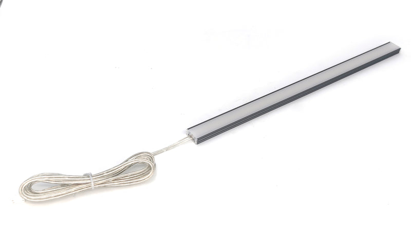 Simple Lighting - Lighteez 2m Surface LED Profile - The full LED profile with the connected cable on a white surface.