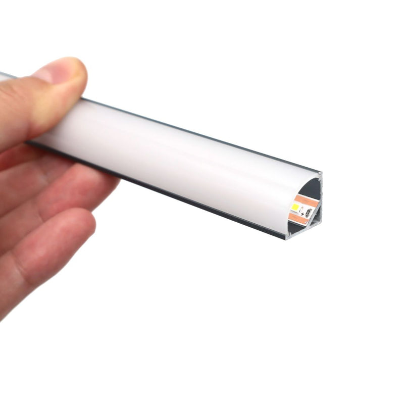 Simple Lighting - Lighteez 2m Corner LED Profile - A hand holding the corner LED profile with a visible interior LED strip.