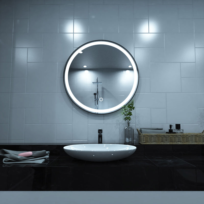 Black LED bathroom mirror above the sink setting in cool white light