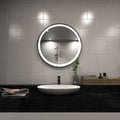 Black LED bathroom mirror above the sink setting in natural white light