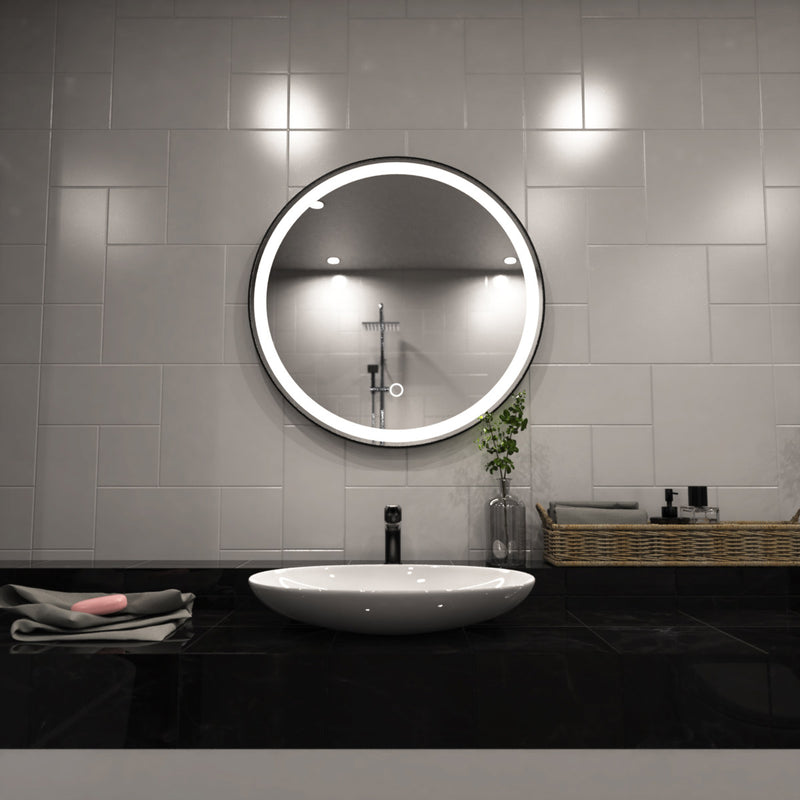 Black LED bathroom mirror above the sink setting in natural white light