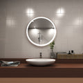 Rose gold LED bathroom mirror above sink setting in natural white light