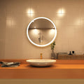 Titanium gold LED bathroom mirror in warm white light above the sink setting shot