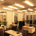 full shot of an office with mounted 60w LED battens with warm white light