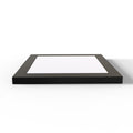 Laid down under-cabinet light with a black bezel, square shaped.