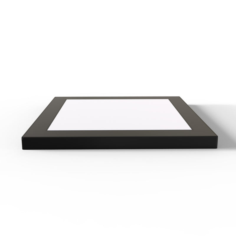 Laid down under-cabinet light with a black bezel, square shaped.