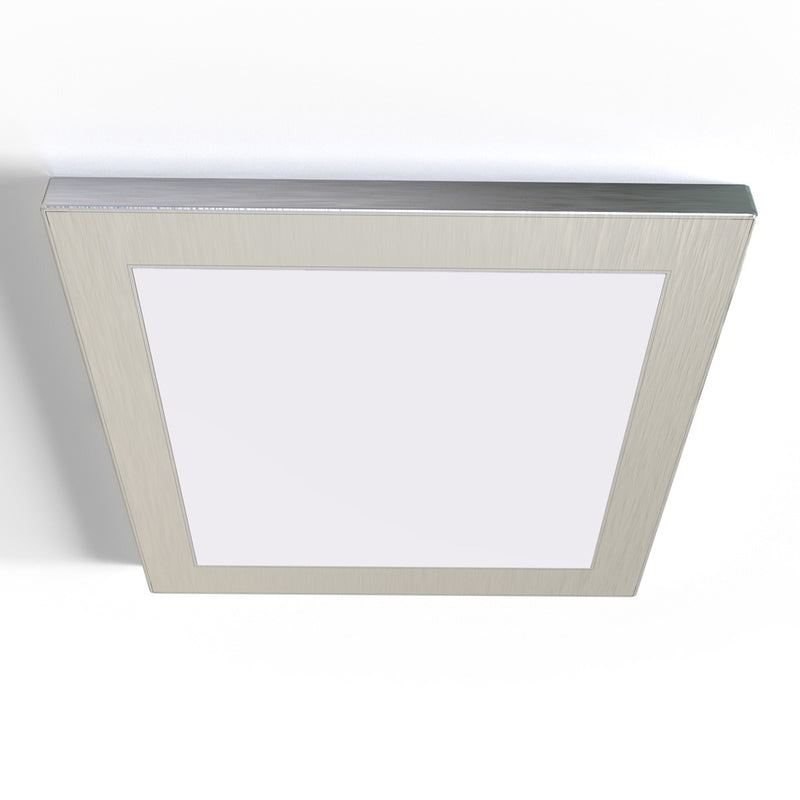 square shaped under cabinet light with magnetic cover on a white surface