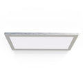 Magnetic cover over under-cabinet light standing on white surface.