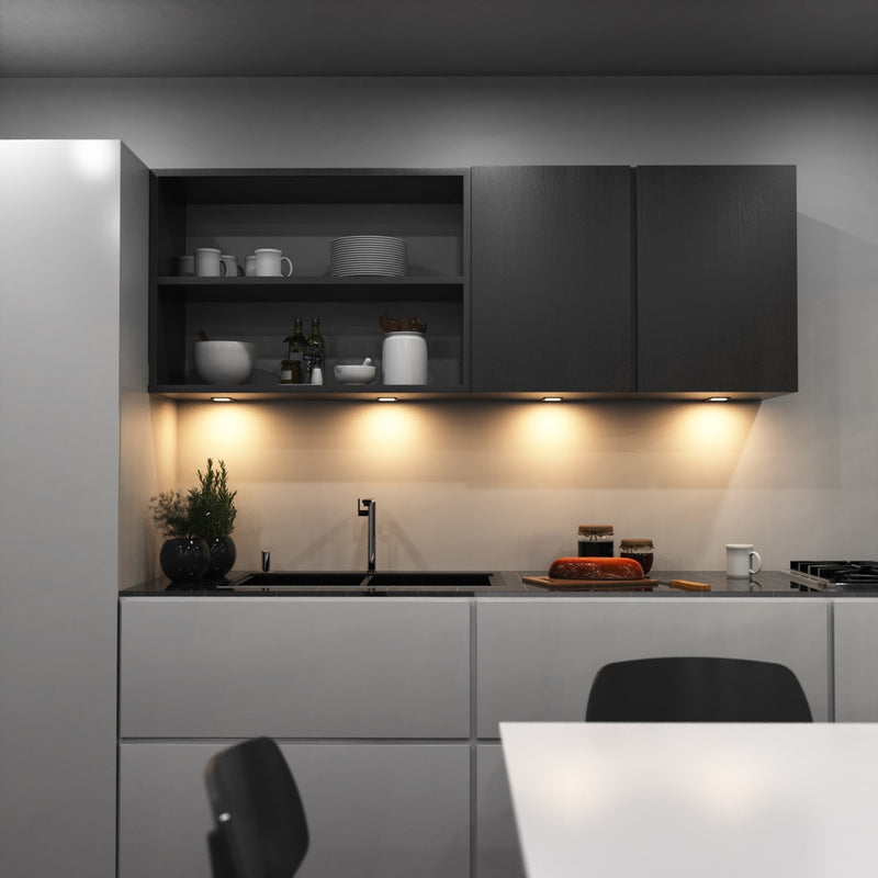 kitchen with mounted black LED CCT cabinet lights - warm white light