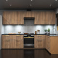 A full kitchen with wooden cabinets and drawers, illuminated by multiple LED downlights and cool white under cabinet lighting.