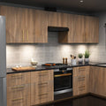A full kitchen with wooden cabinets and a worktop illuminated by natural white slim under-cabinet lights.
