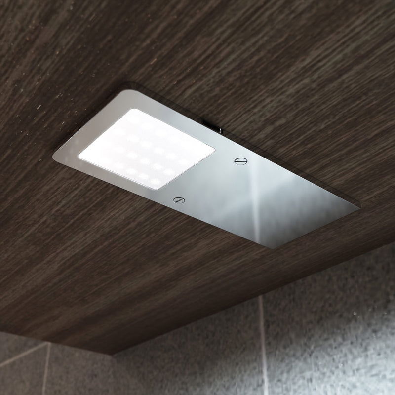 close up of a mounted LED cabinet light with cool white light