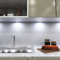 mid shot of a kitchen with mounted matte white LED CCT cabinet lights - cool white light