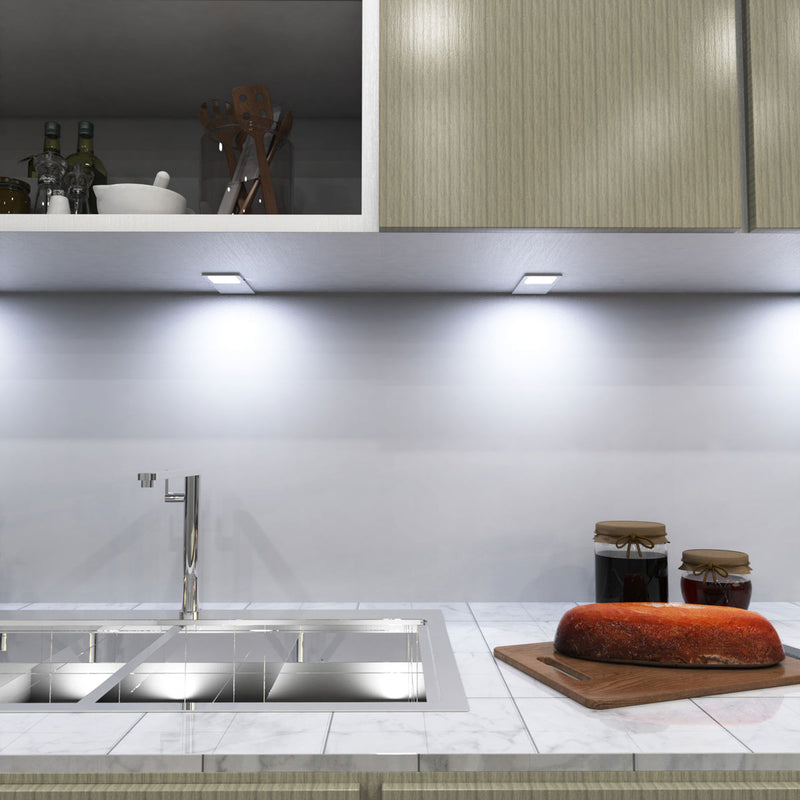 mid shot of a kitchen with mounted matte white LED CCT cabinet lights - cool white light