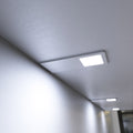 close up of a mounted matte white CCT LED cabinet lights - cool white light