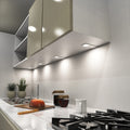kitchen with mounted matte white LED CCT cabinet lights - natural white light
