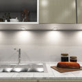 mid shot of a kitchen with mounted matte white LED CCT cabinet lights - natural white light