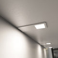 close up of a mounted matte white CCT LED cabinet lights - natural white light
