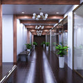 full shot of a hallway with cool white LED panel lights