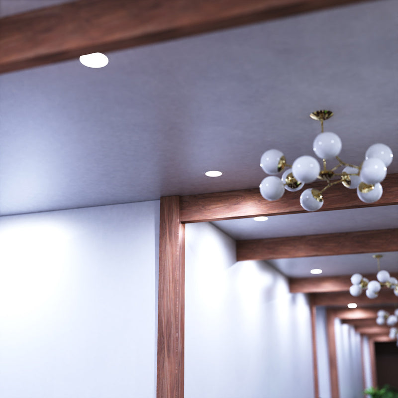 mid shot of a hallway ceiling with cool  white LED panel lights