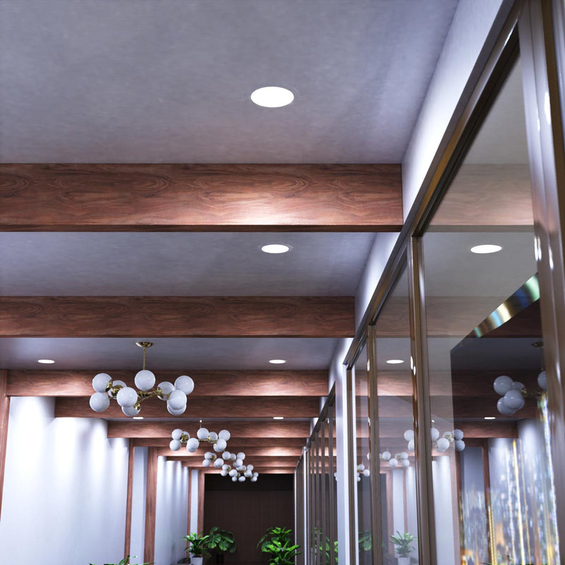 mid shot of a hallway ceiling with cool white LED panel lights
