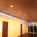 mid shot of a hallway ceiling with warm white LED panels