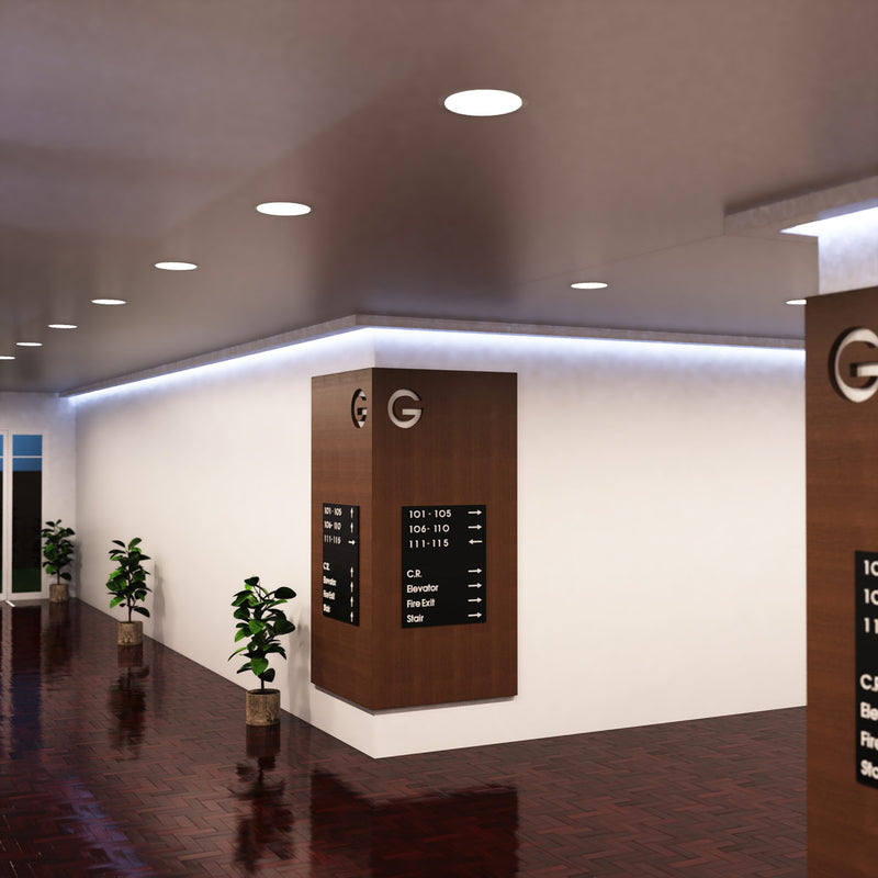 full shot of a corner hallway with natural white LED panel lights