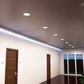 mid shot of a hallway ceiling with natural white LED panels