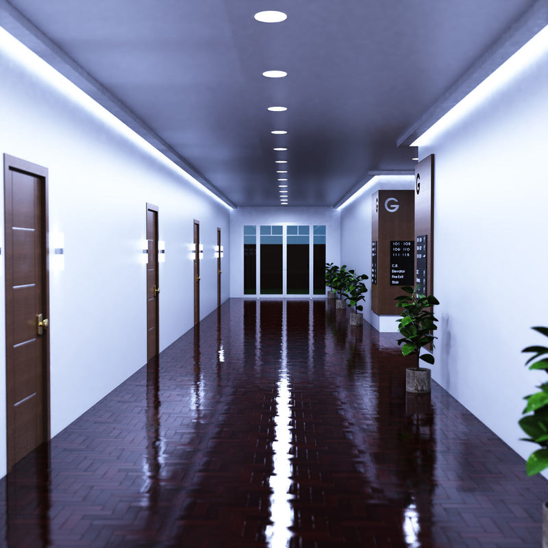 full shot of a hallway with cool white LED panel lights