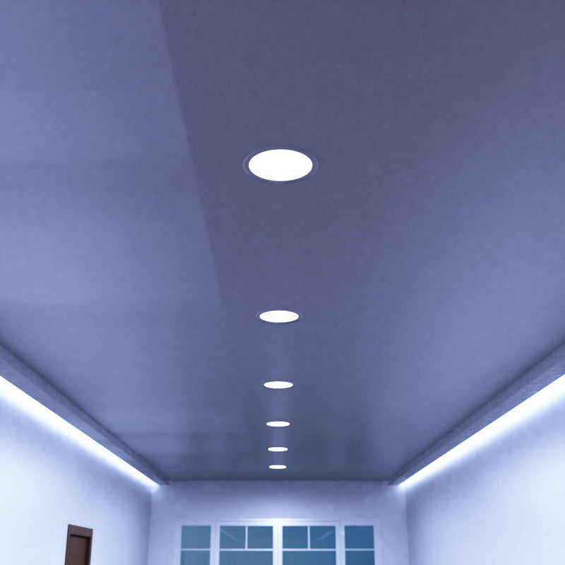 mid shot of a hallway ceiling with cool white LED panel lights