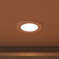 close up of a mounted LED panel light in warm white light