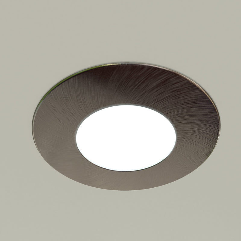 close up shot of a mounted natural white brushed chrome downlight