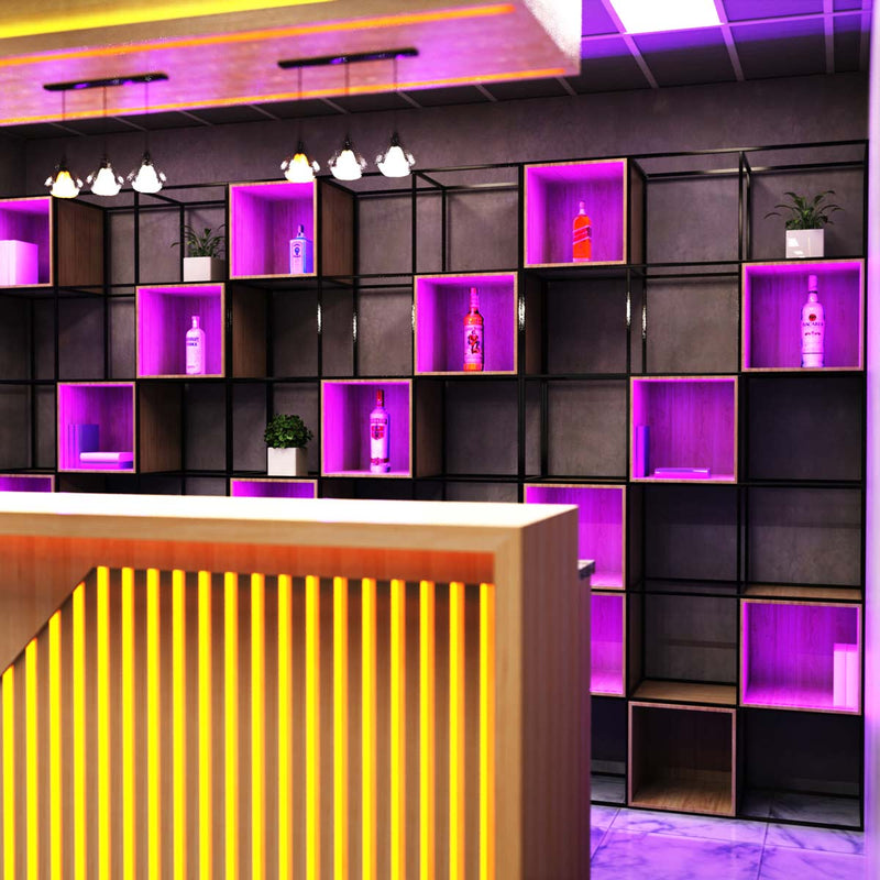 mid shot of a bar with yellow, purple and orange strip lights