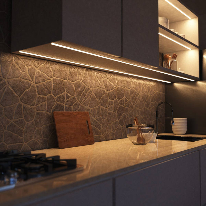 side close up of a kitchen with natural white strip lights